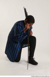 Garson KNEELING POSE WITH KATANA AND SHOTGUN